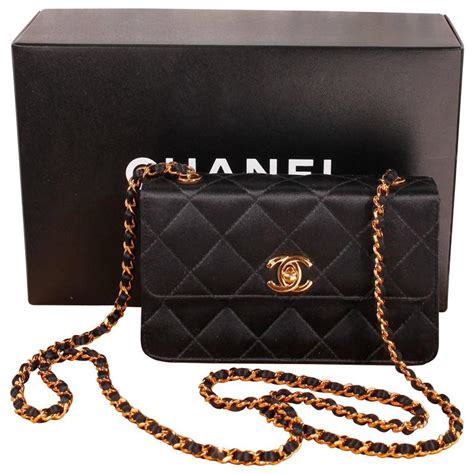 black chanel clutch|chanel clutch with hand strap.